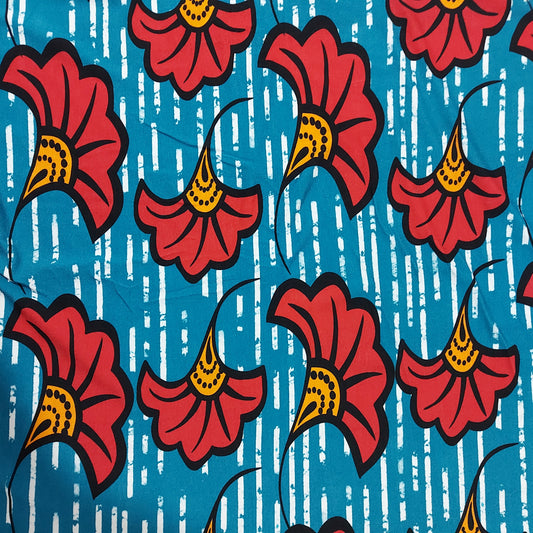 Red floral, blue background, African print viscose elastane/lycra stretch jersey, apparel fabric, sold by the half metre